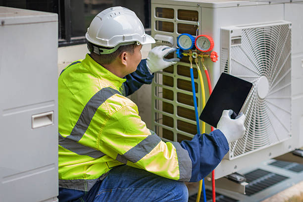 Professional Heat Pump Repair technician working in Mayville, NY